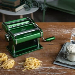 Marcato Atlas 150 Pasta Maker, Green -Chic Kitchen Supplies marcato atlas green pasta maker in use borough kitchen ba7f70d7 de32 4ae0 b38d 184b204680fe 1296x